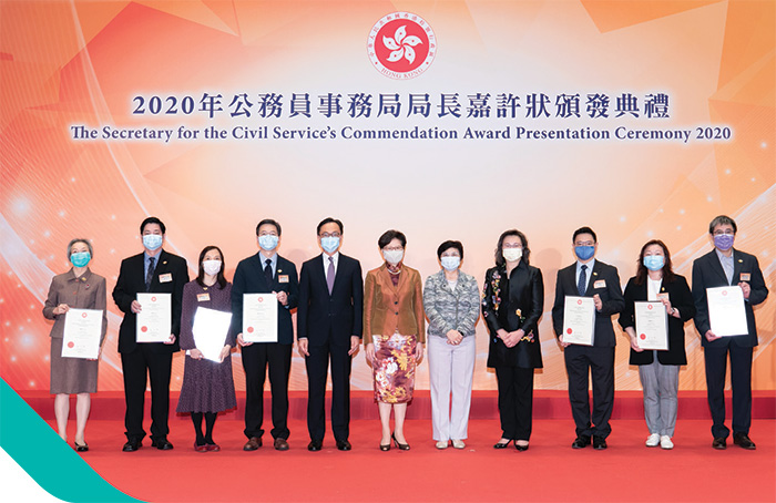 The Chief Executive, Mrs Carrie Lam Cheng Yuet-ngor (centre), the Secretary for the Civil Service, Mr Patrick Nip Tak-kuen (fifth left); the Chairman of the Public Service Commission, Mrs Rita Lau Ng Wai-lan (fifth right); and the Permanent Secretary for the Civil Service, Mrs Ingrid Yeung Ho Pui-yan (fourth right), were pictured with award recipients.