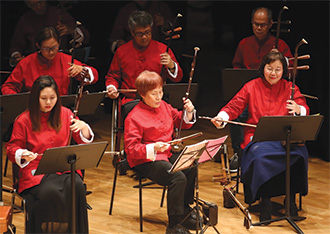 First performance of Ms Hui (first right) and the HKRP Chinese Orchestra at the Concert Hall of Hong Kong City Hall.