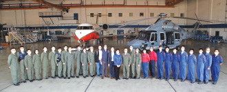 Mr Lee (left 15) accompanied the Chief Executive, Mrs Carrie Lam (centre) to visit the headquarters of the Government Flying Service.