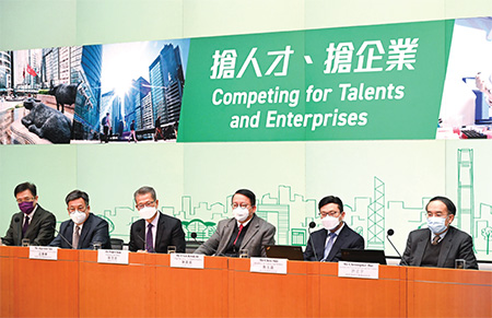 The Chief Secretary for Administration, Mr Chan Kwok-ki (third right), together with other Principal Officials, conducted a press conference on 23 December 2022 to explain the implementation details of the Government’s measures to compete for talents and enterprises. Such measures included the launch of the Talents Service Unit’s online platform and a series of newly added or enhanced talent admission schemes in late December 2022.