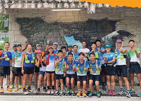 Mr Chan (second right) taught people of different ages hiking and trail running skills and in particular wanted to enhance children’s physical fitness and willpower through training.