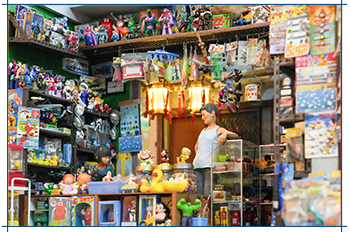 Mr Ho has created an array of miniature models.  His first artwork is themed on a toy shop in Hong Kong in the 1970s, and one of his favourite creations features a stall selling pinwheels in Wong Tai Sin.