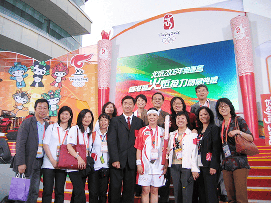Mr Wong (back row, first right) attended the closing ceremony of the Beijing 2008 Olympic Torch Relay in Hong Kong.