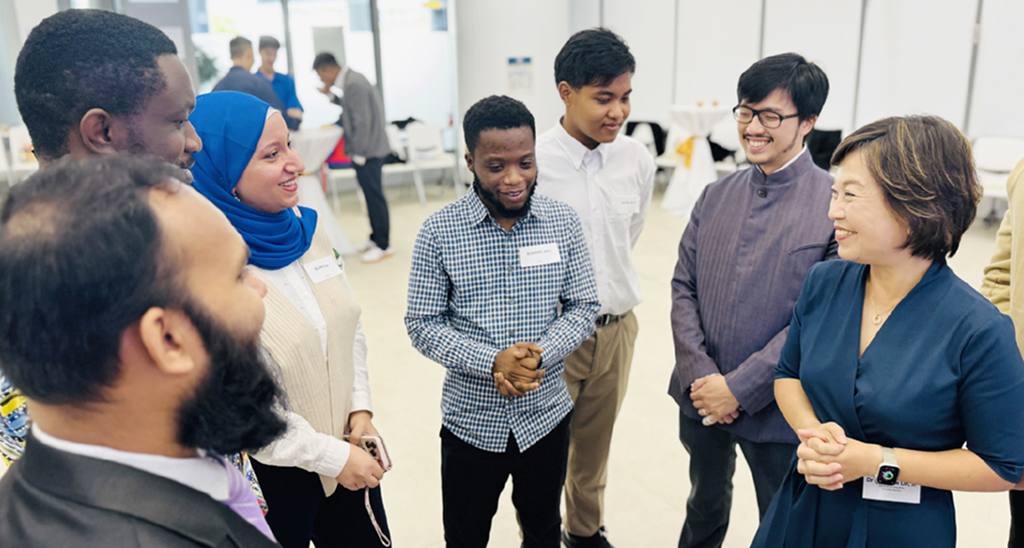 EDB has been organising annual sharing sessions for new Belt and Road Scholarship awardees since the 2024/25 academic year. Dr Choi (first right) and Mr Nicolas Ho Lik-chi (second right), the Commissioner for Belt and Road, talked to the attendees to learn more about their study life in Hong Kong.  