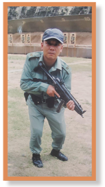A photograph of Mr Yu taken during his service in the Police Force.