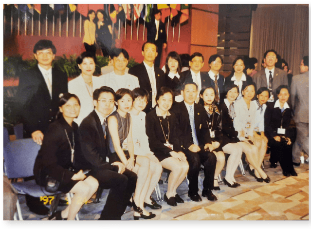In 1997, the World Bank Group/International Monetary Fund Annual Meetings were held at the Hong Kong Convention and Exhibition Centre.  Mr Suen (back row, fourth left) was responsible for overseeing various works at the venue to ensure their timely completion before the Meetings. 